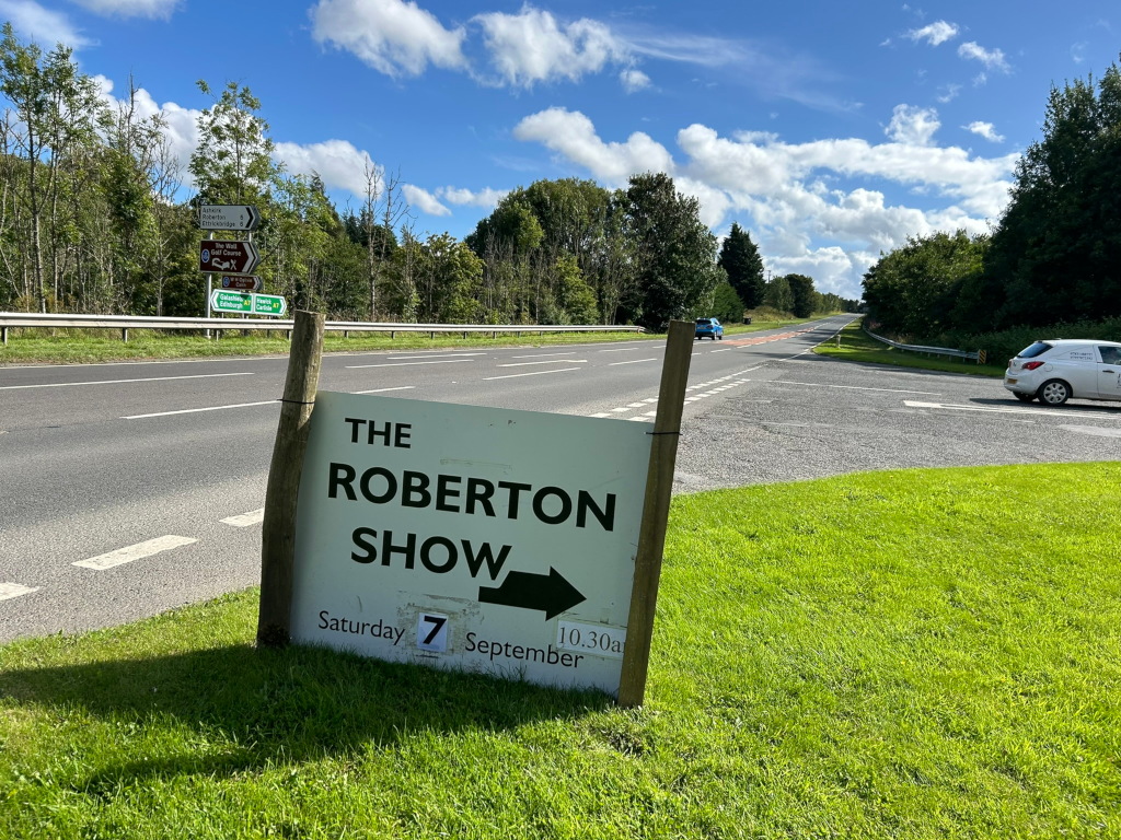 the other side of the event sign reads the roberton show 7th september